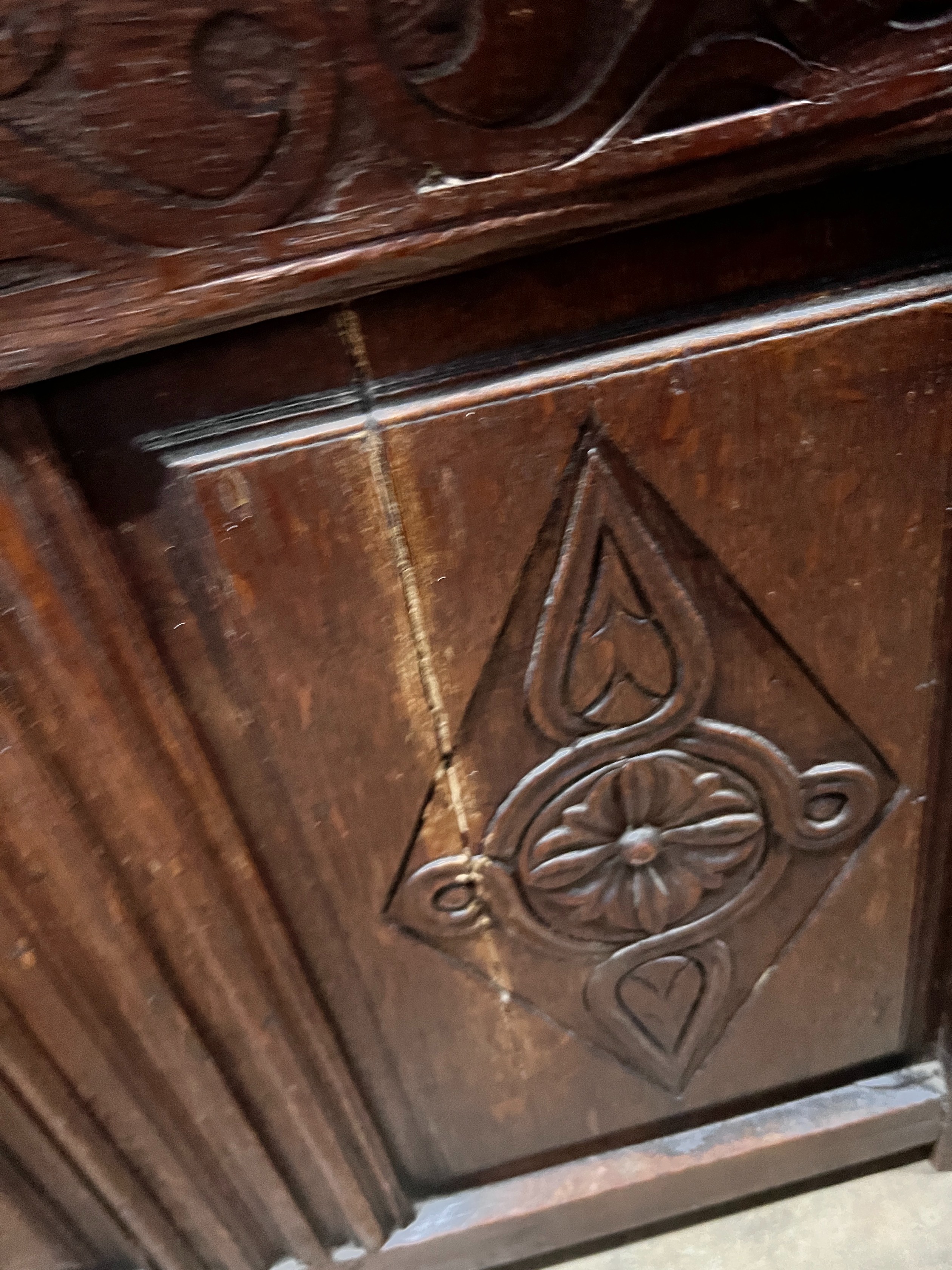 An early 18th century panelled oak coffer, width 154cm *Please note the sale commences at 9am.